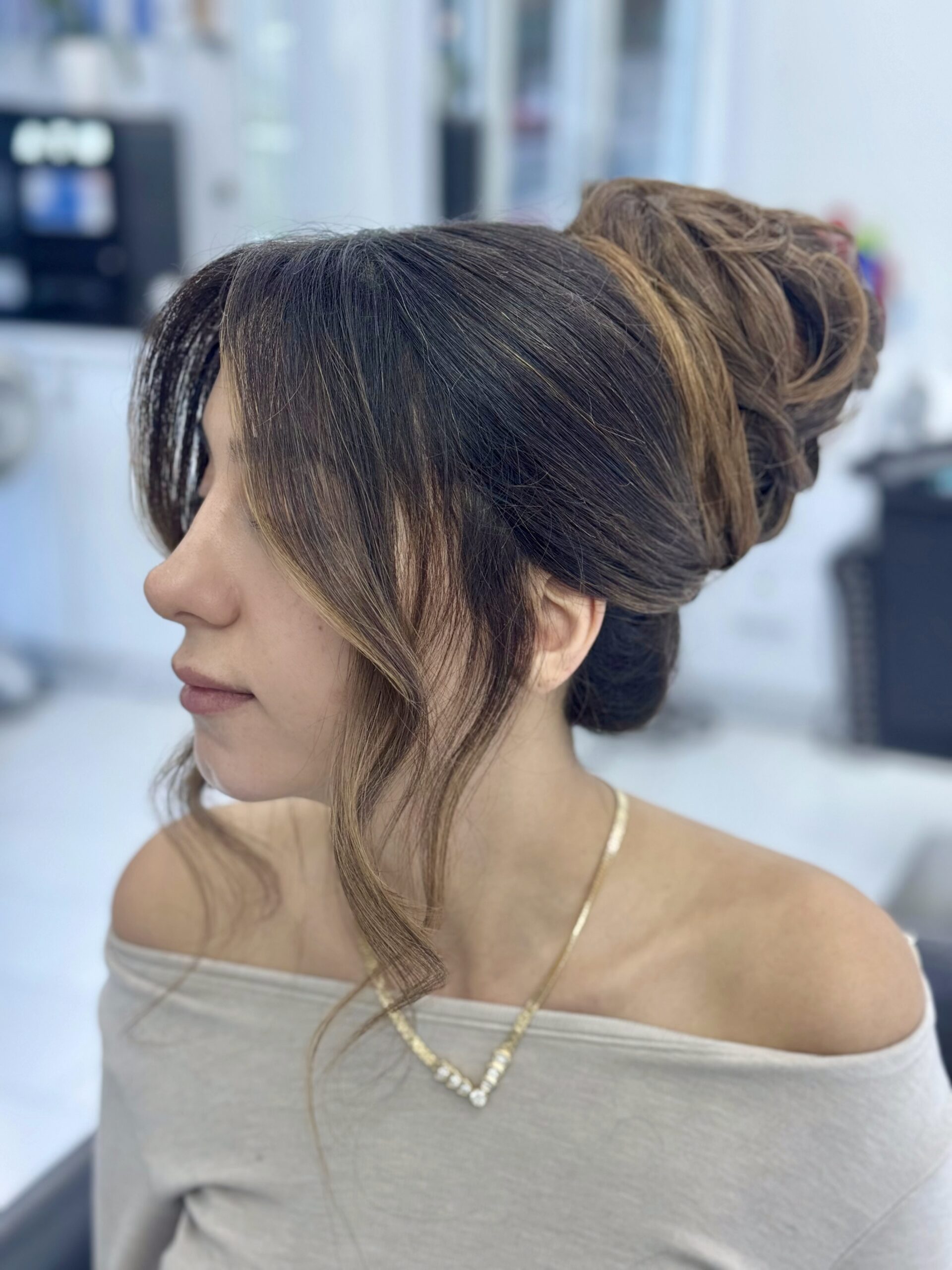 Elegant bridal updo bun styled in the salon