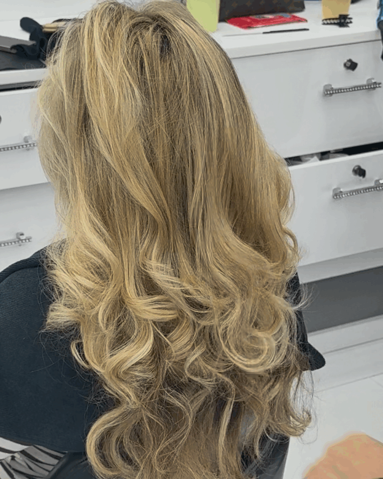 Long blonde curly blowout by Lydia