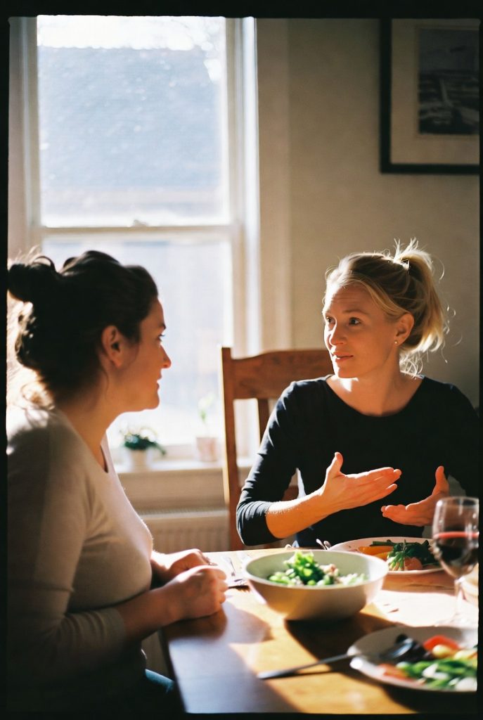 Two women in conversation over a meal