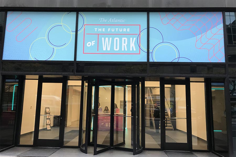 Venue entrance with digital display for The Atlantic Future of Work conference