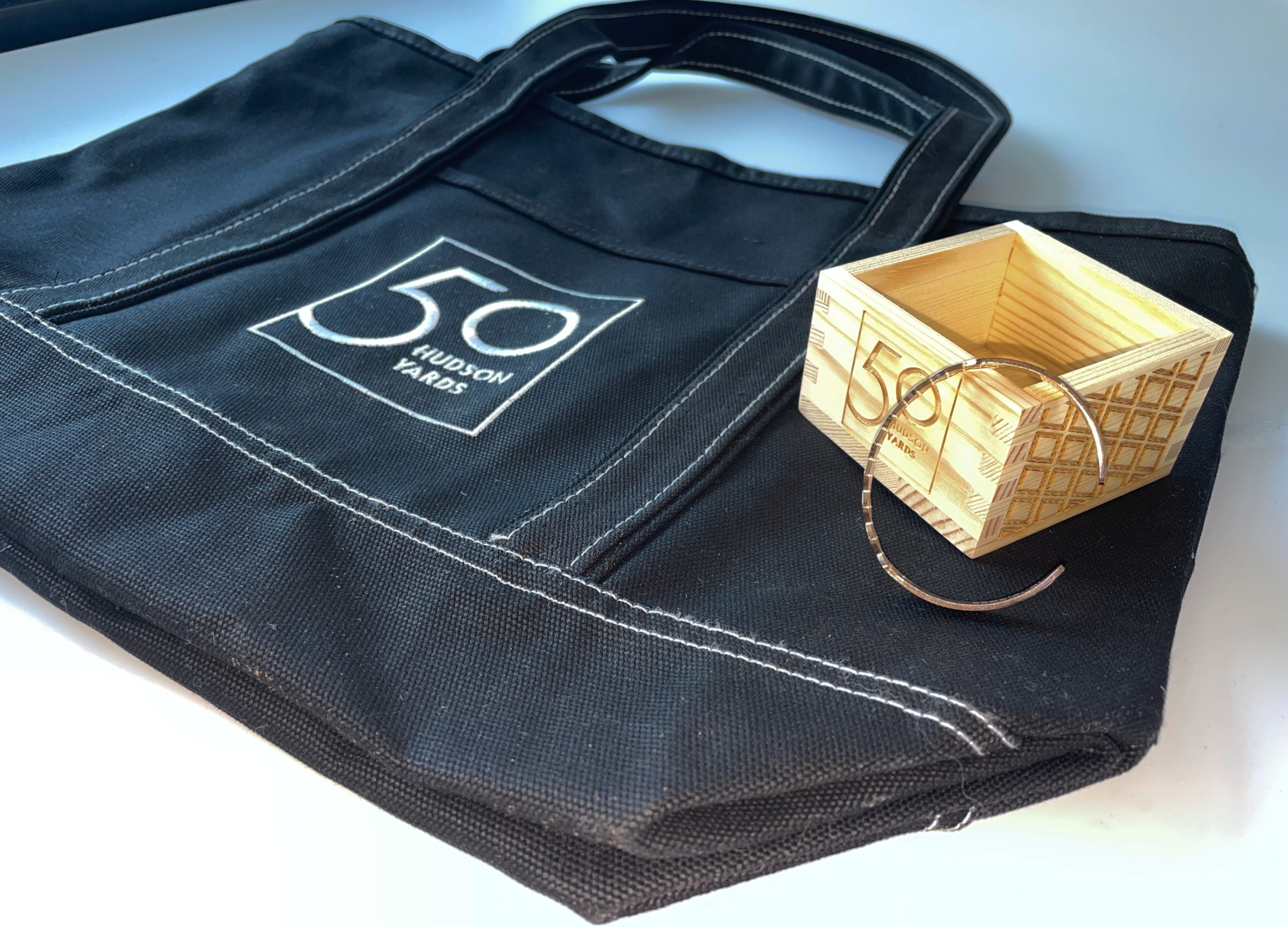 50 Hudson Yards branded tote bag with matching wooden trinket box and bracelet