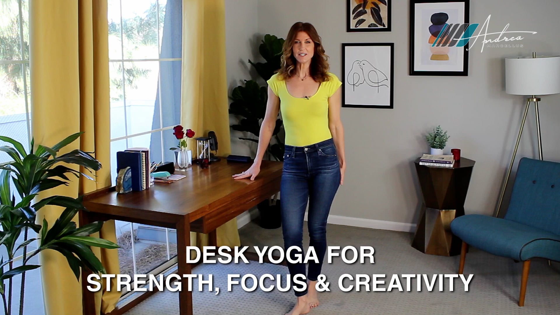 Andrea Marcellus in a yellow top in a home office