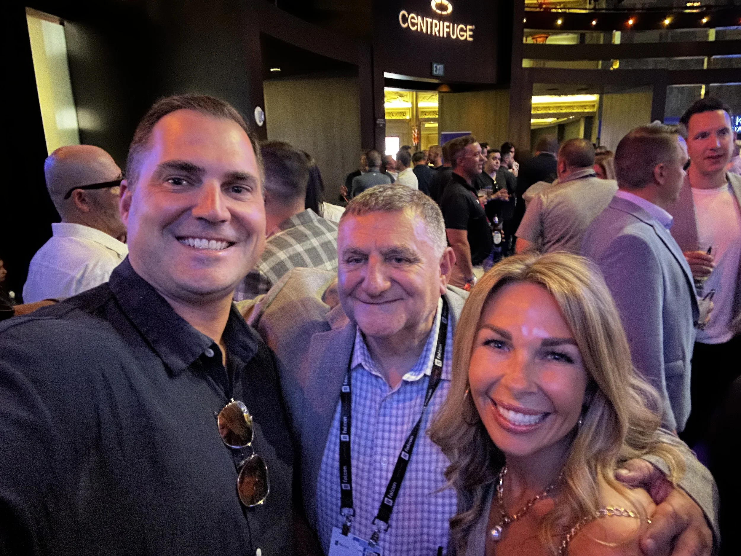 Three people taking a selfie at the Centrifuge bar event venue