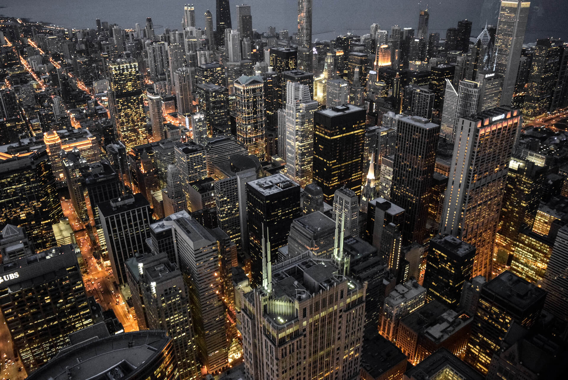 Aerial night skyline of a financial city district