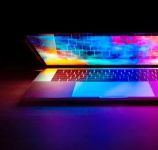 MacBook with vibrant RGB backlit display