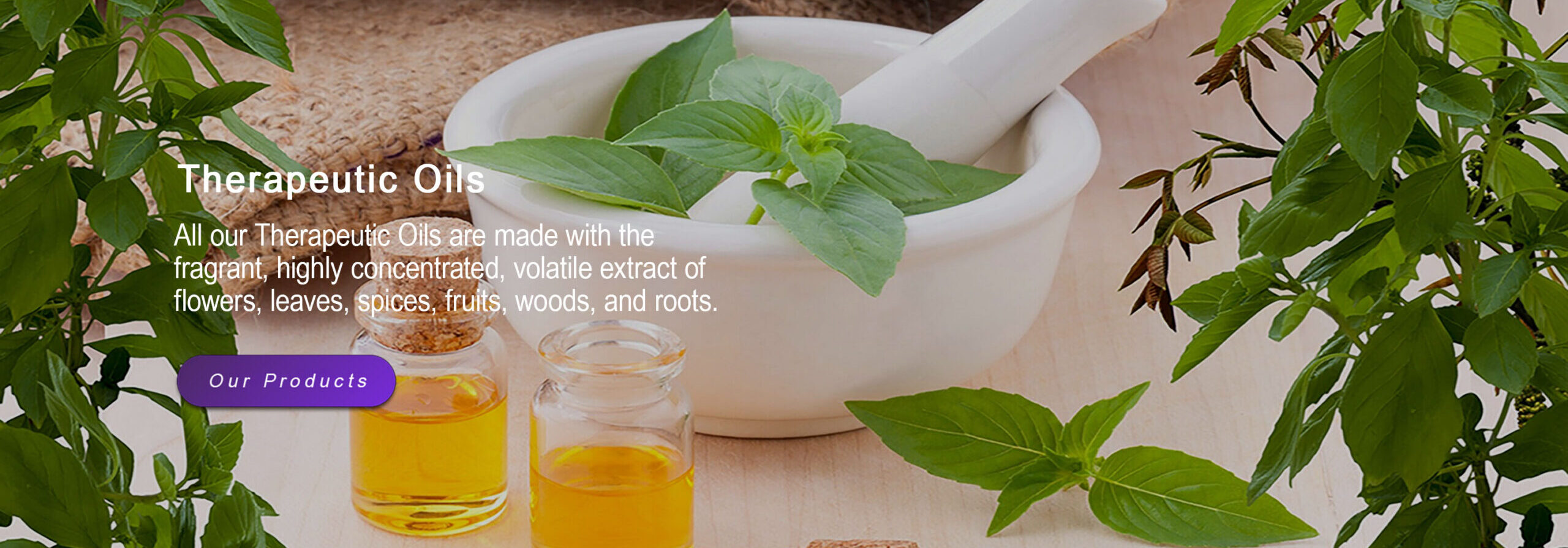 Mortar and pestle with fresh herbs beside glass oil bottles