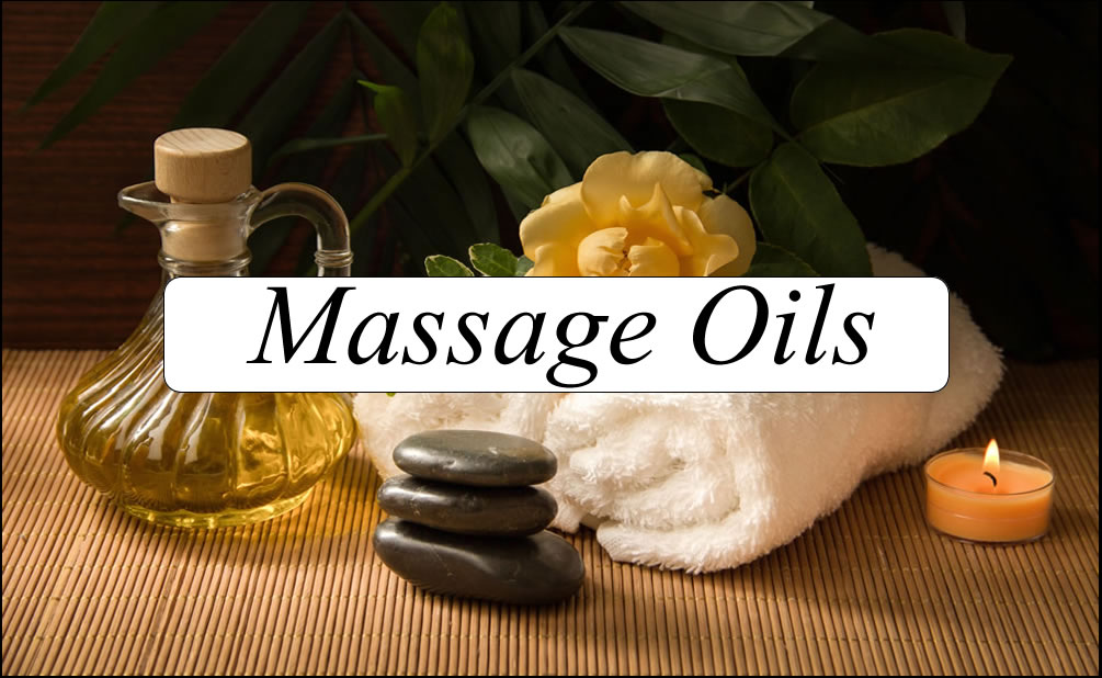 Massage oil, hot stones, towel and candle — Massage Oils