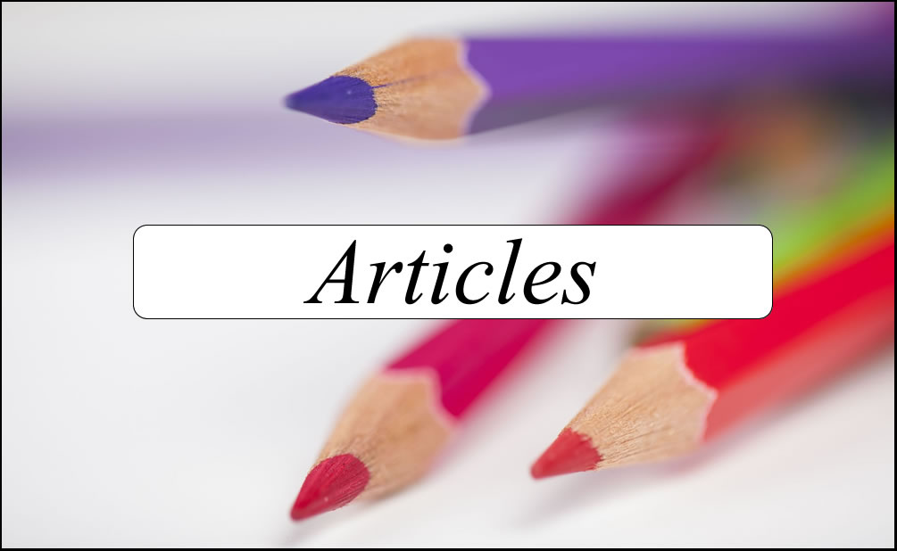 Colourful pencils on a white surface — Articles