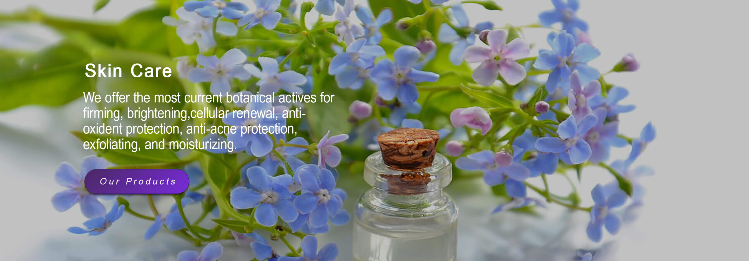Small corked bottle among blue botanical flowers