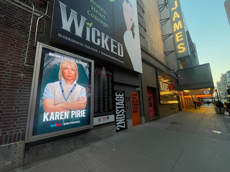 BritBox 'Karen Pirie' display case poster next to Gershwin Theatre signage, NYC