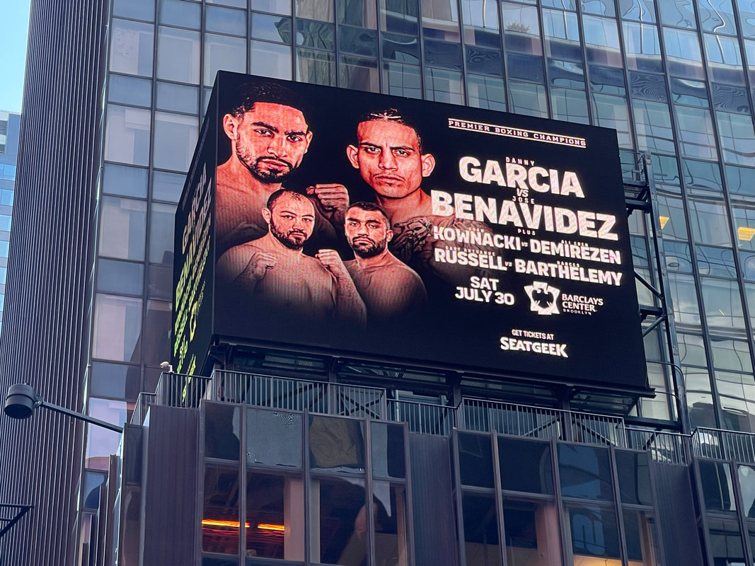 Garcia vs Benavidez Premier Boxing Champions billboard on a Times Square building