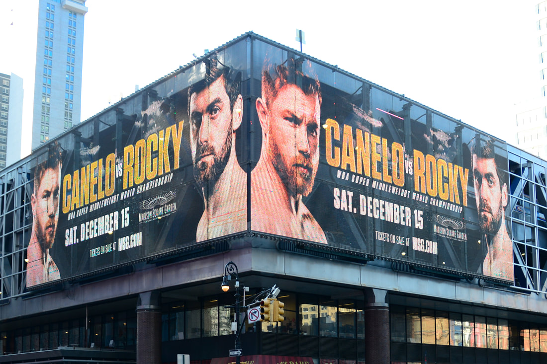 Canelo vs Rocky boxing championship billboard wrapping MSG exterior, NYC