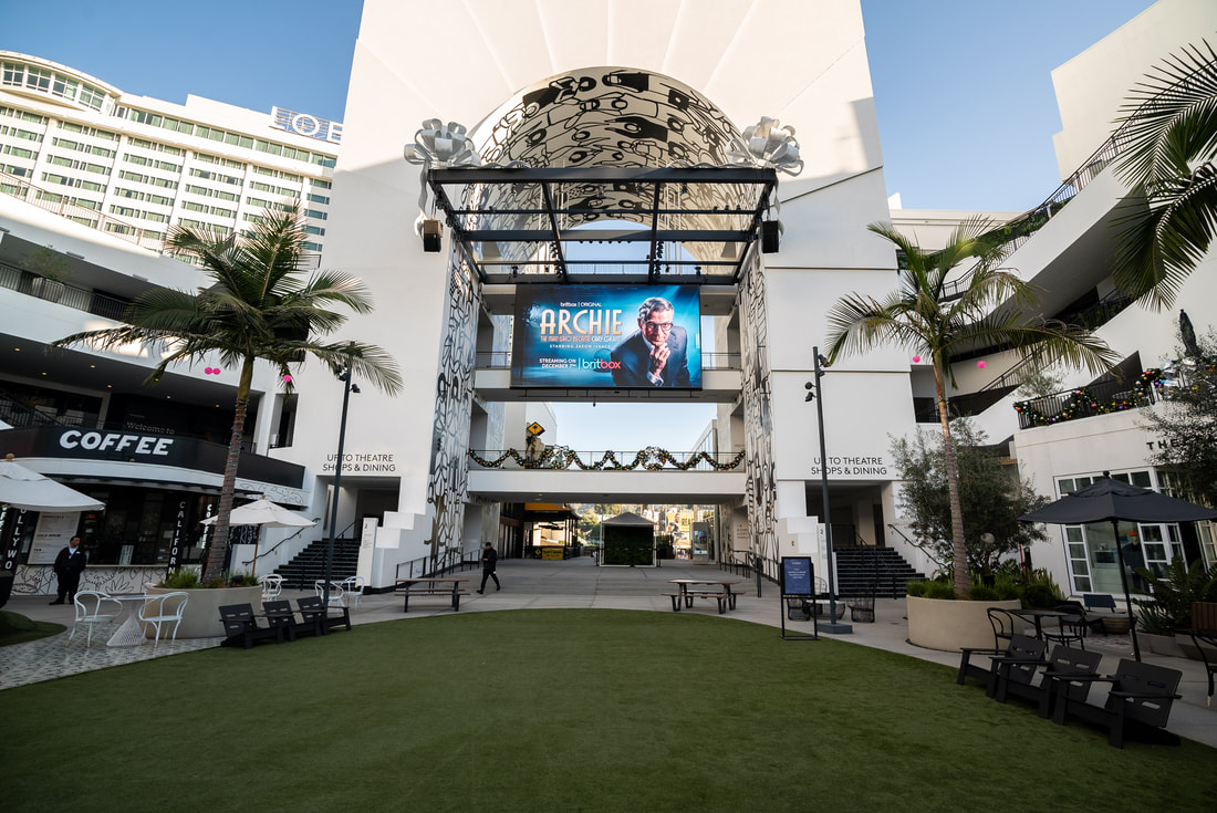 BritBox 'Archie' digital screen at Ovation Hollywood outdoor courtyard