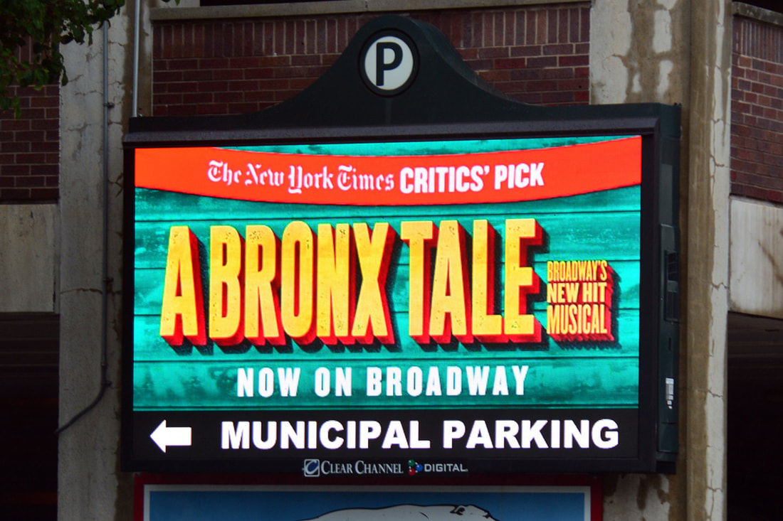 A Bronx Tale Broadway musical digital sign on a parking garage LED board