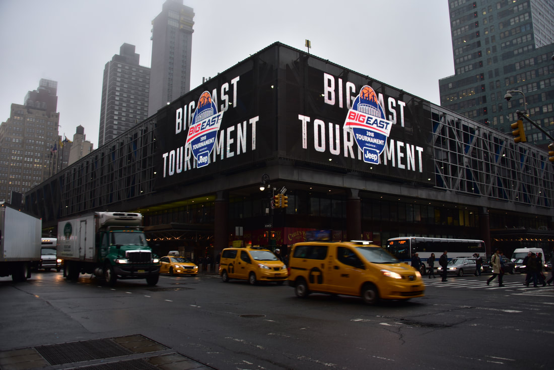 Big East Basketball Tournament billboard wrapping Madison Square Garden exterior, NYC