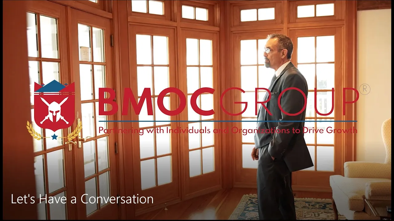 A leader from The BMOC Group standing in an elegant room