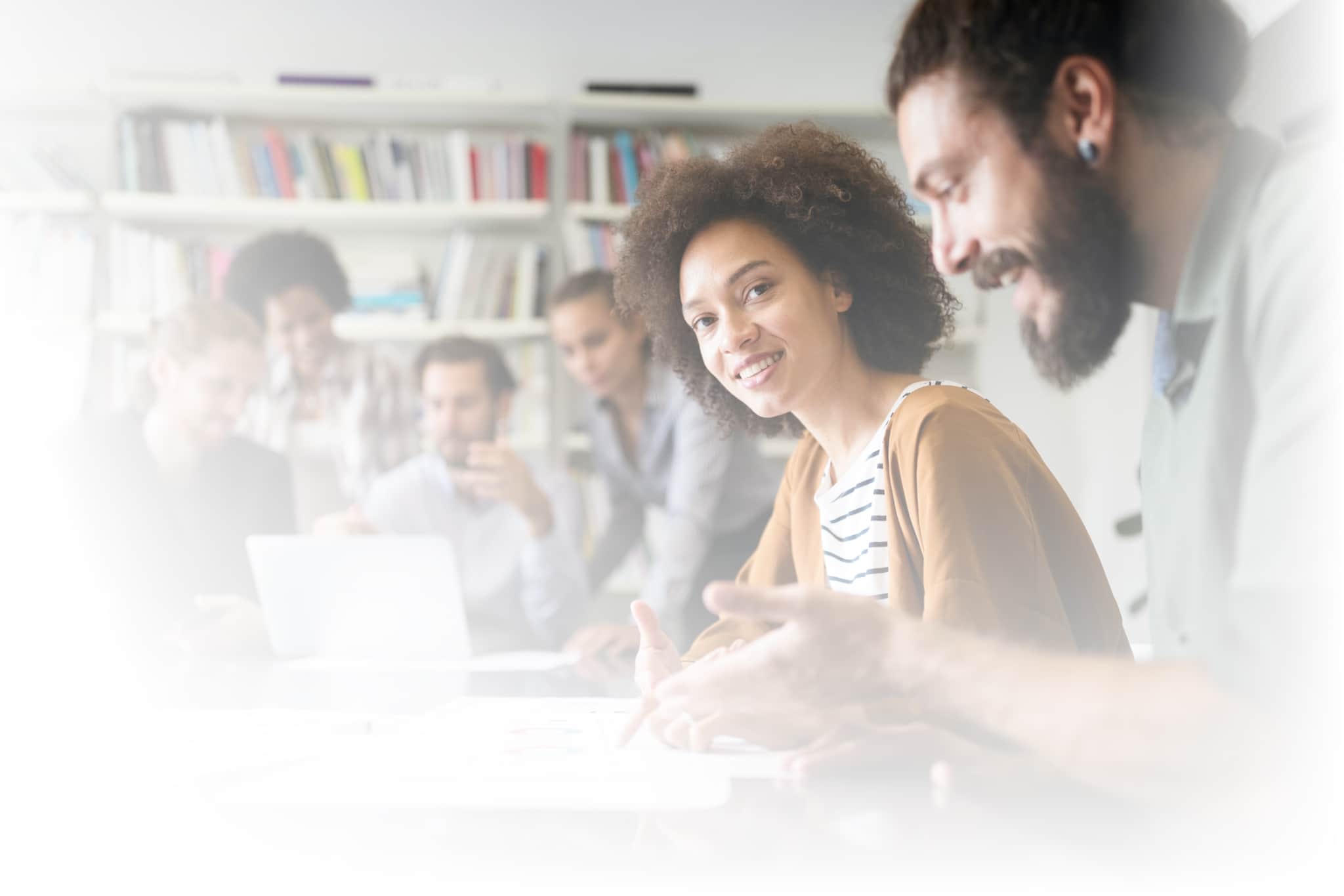Diverse group of professionals collaborating around a table