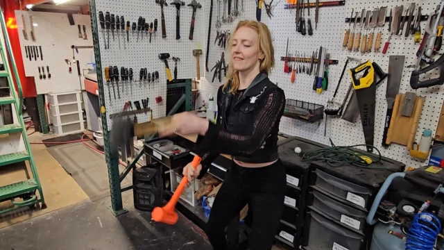 Instagram reel: member smiling while handling tools in the Collab MakerSpace workshop