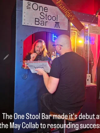 Instagram post: two people at the One Stool Bar installation at a Collab event