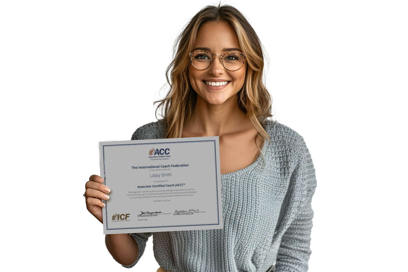 Woman holding her ICF Associate Certified Coach certificate