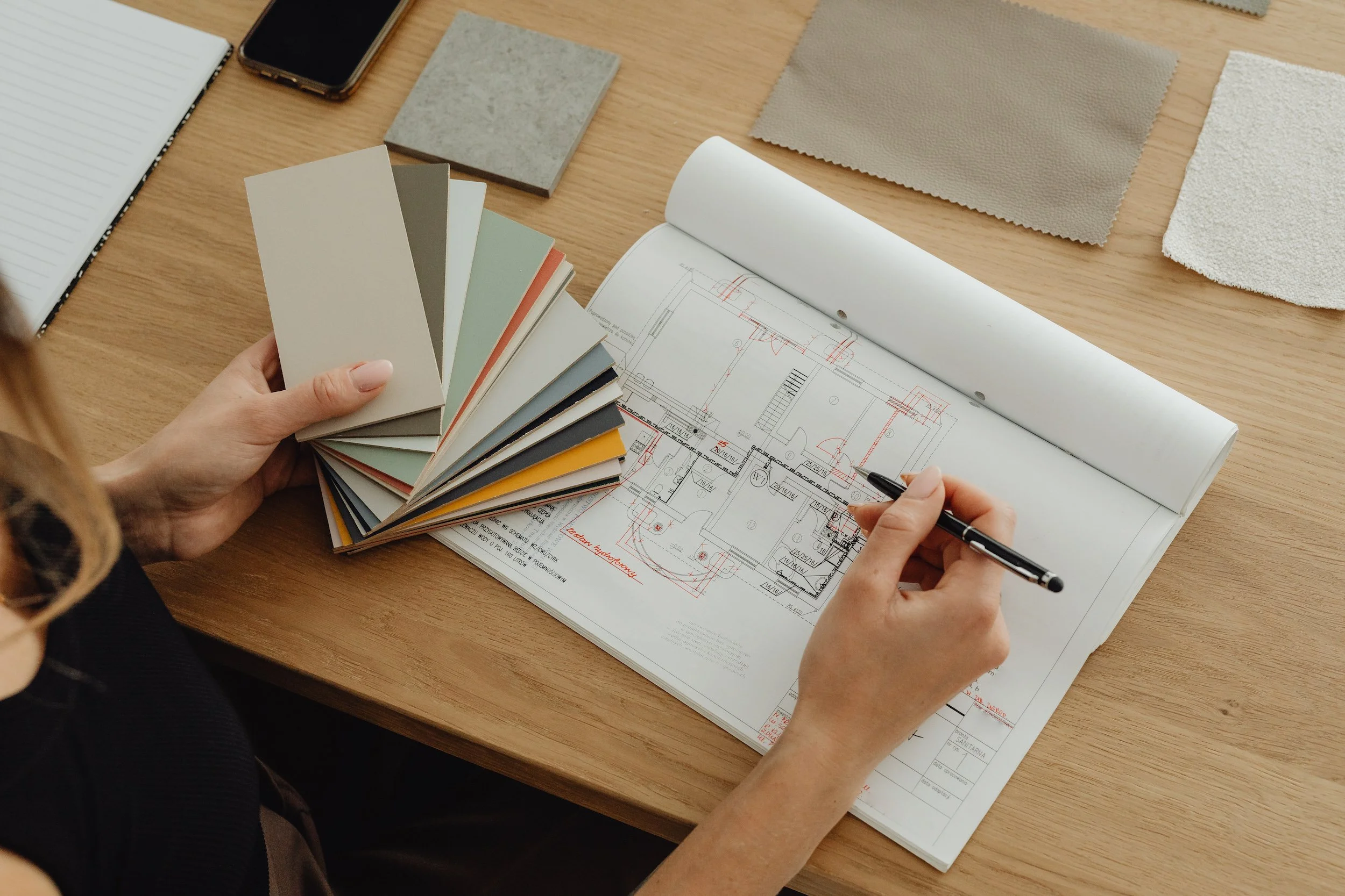 Color swatches laid over architectural floor plans