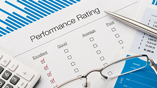 A performance rating form on a desk