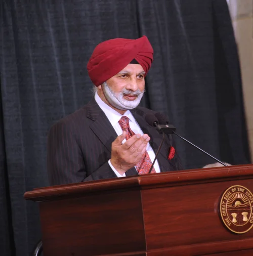 Ratanjit S. Sondhe in a red turban speaking at an official Ohio state podium