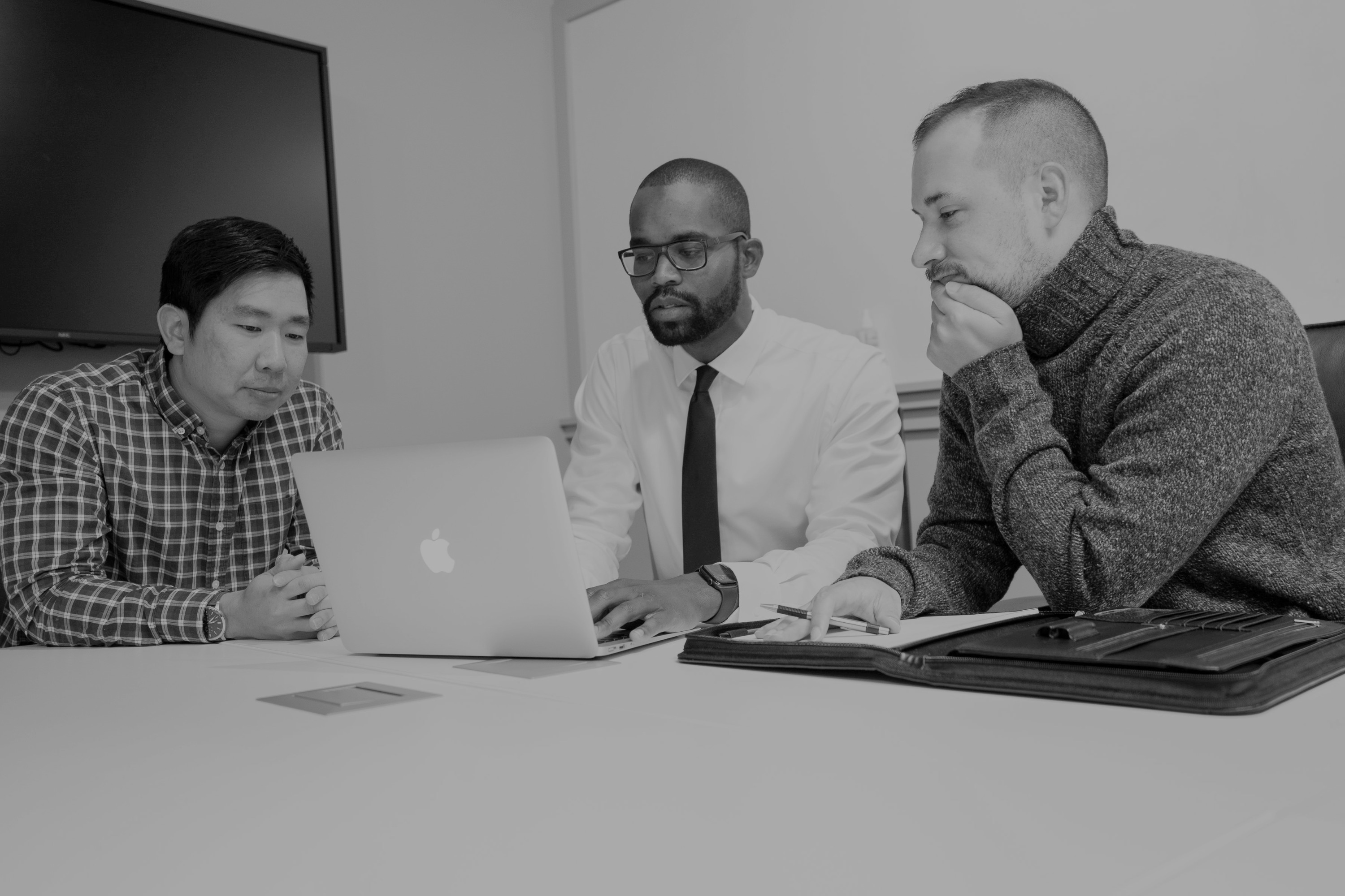 Dom Gardner in a strategy session with business owners