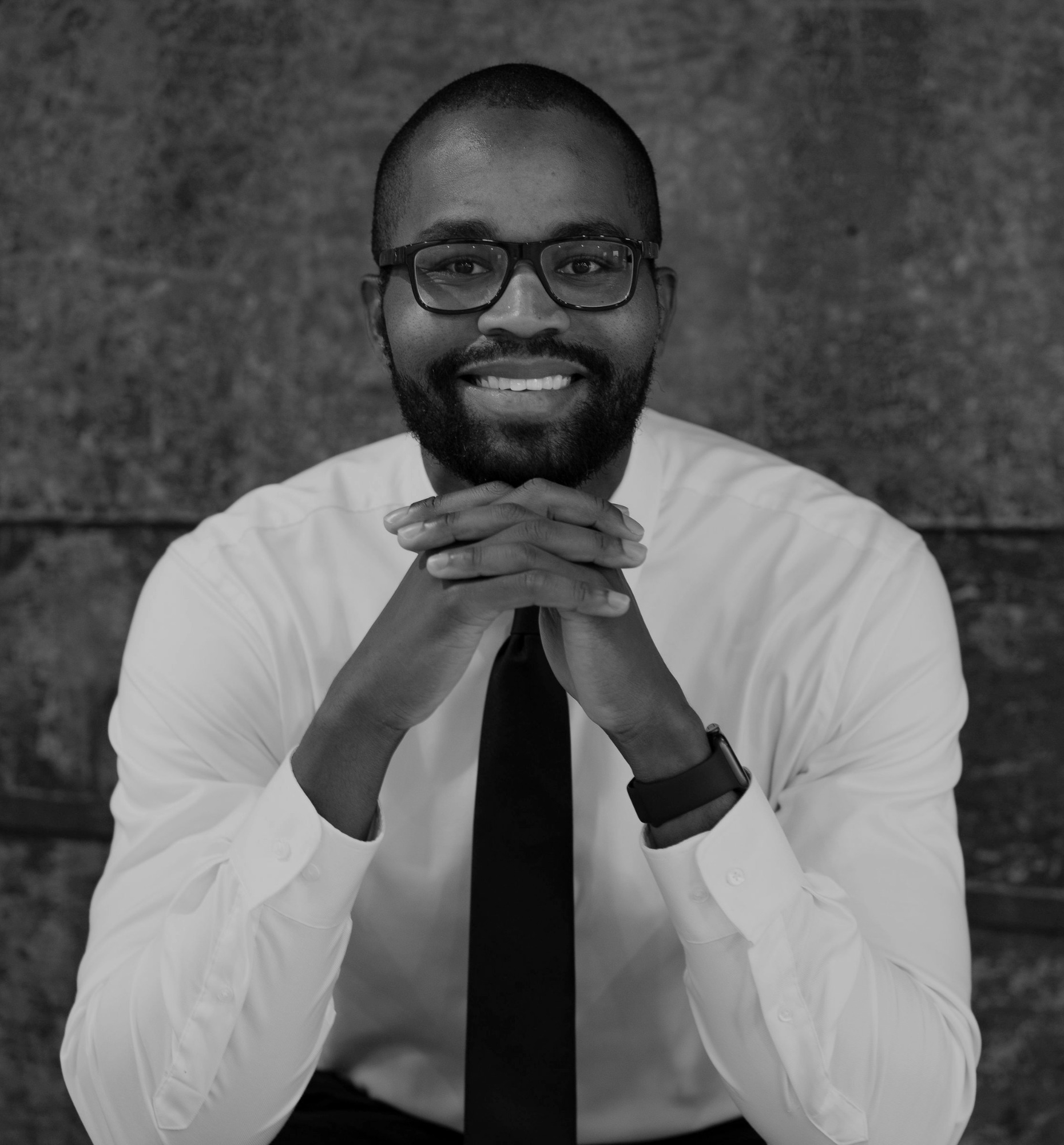 Dom Gardner, business and leadership coach, black-and-white portrait
