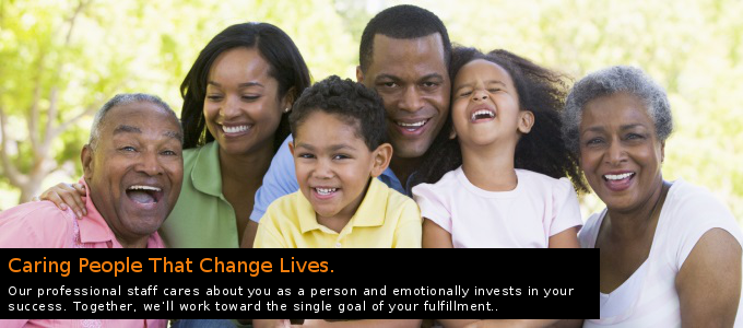 Multi-generational Black family laughing outdoors, captioned “Caring People That Change Lives.”