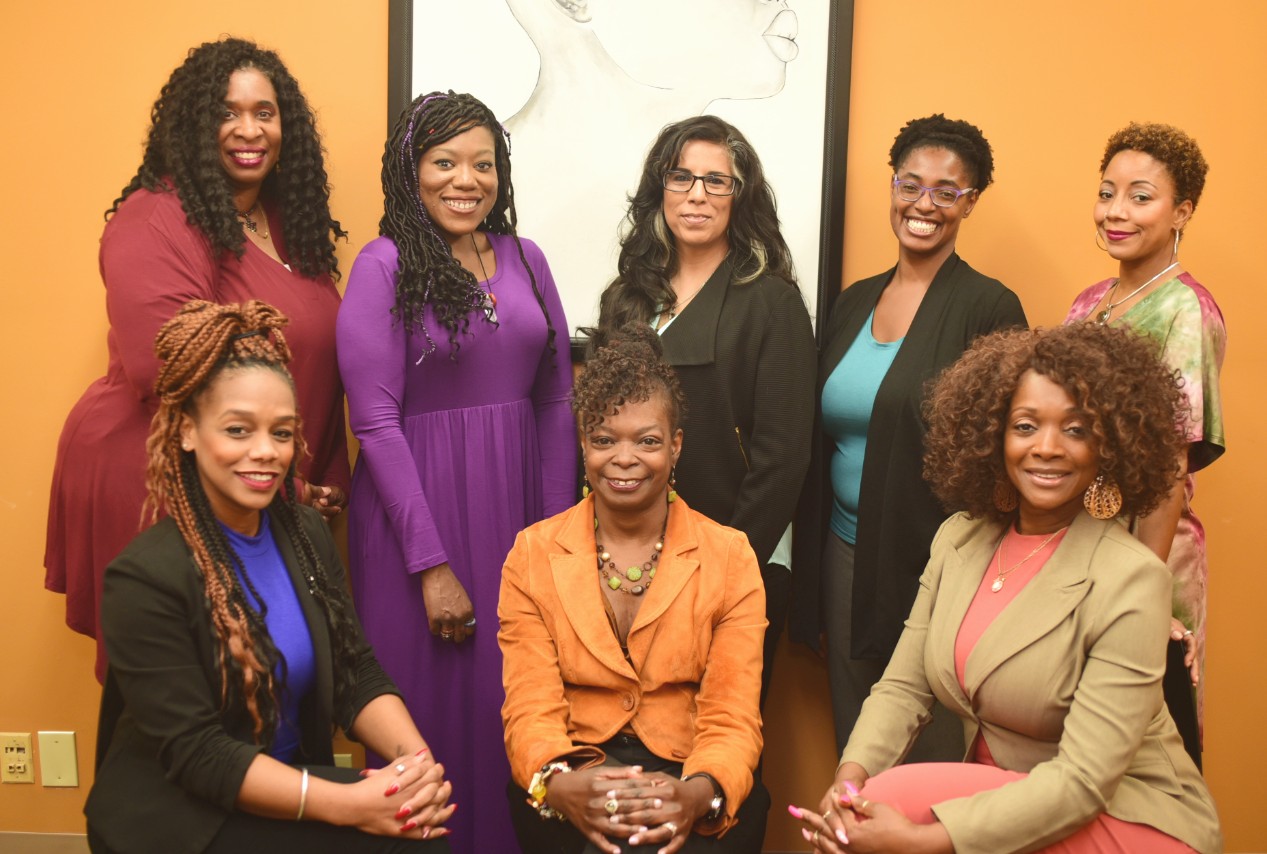 Group portrait of the eight women clinicians of Dr. Vernita Marsh & Associates in their Oakland office