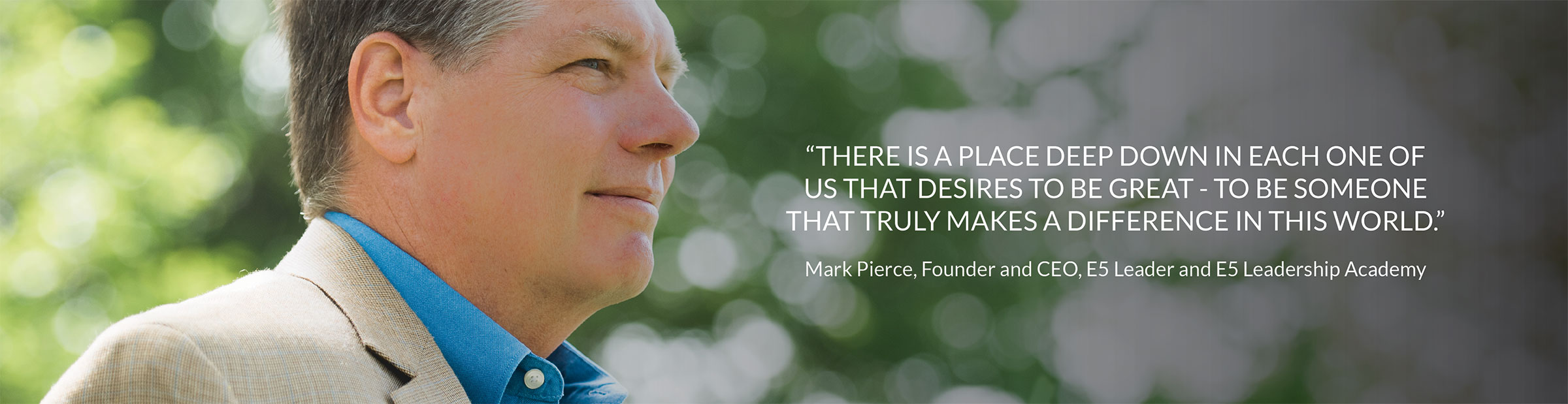 Mark Pierce in a tan blazer looking upward, beside his quote about the desire to be great