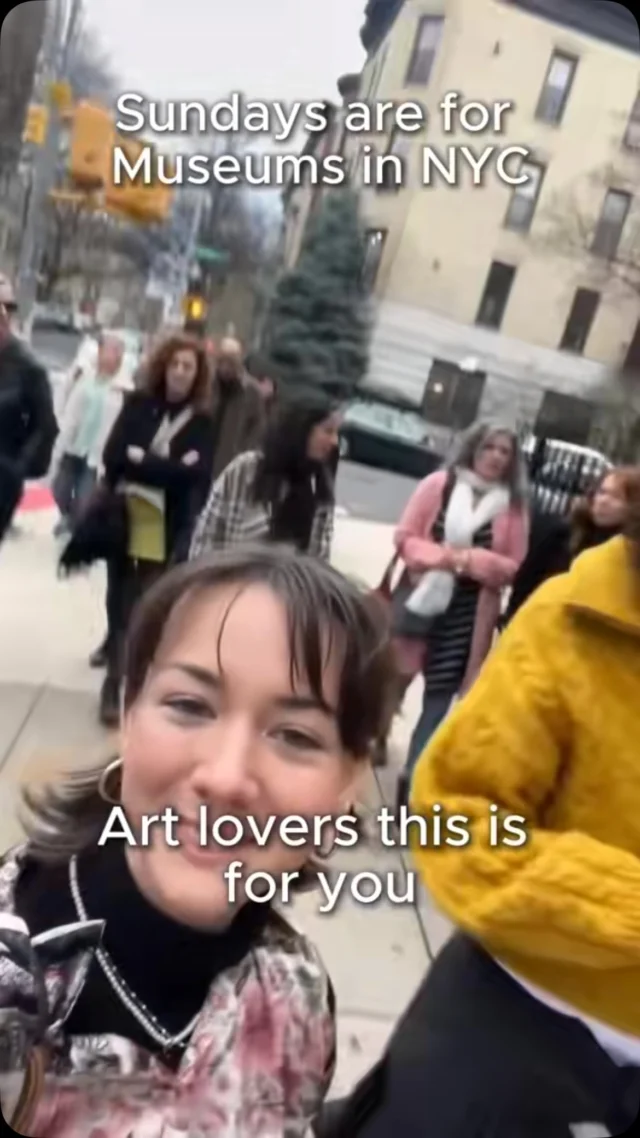 Woman taking a selfie with a group on an NYC street, overlay text: Sundays are for museums in NYC