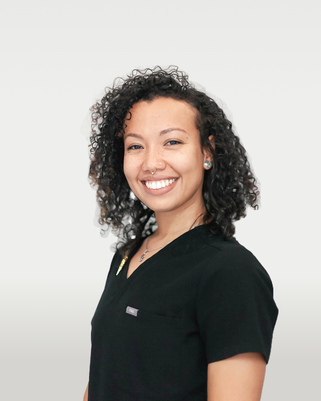 Portrait of Tai Ng Garcia, LMT CLDT, massage therapist at Encore Wellness