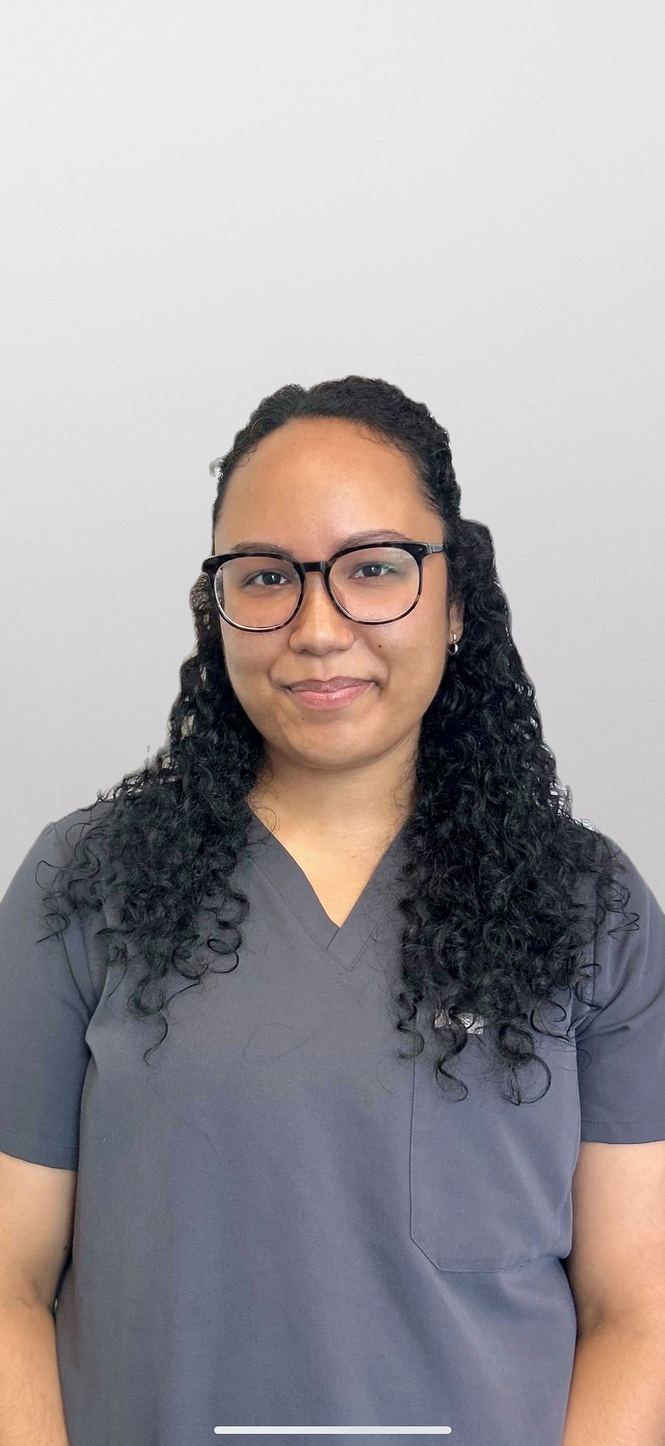 Portrait of Elizabeth Arias, LMT, massage therapist at Encore Wellness