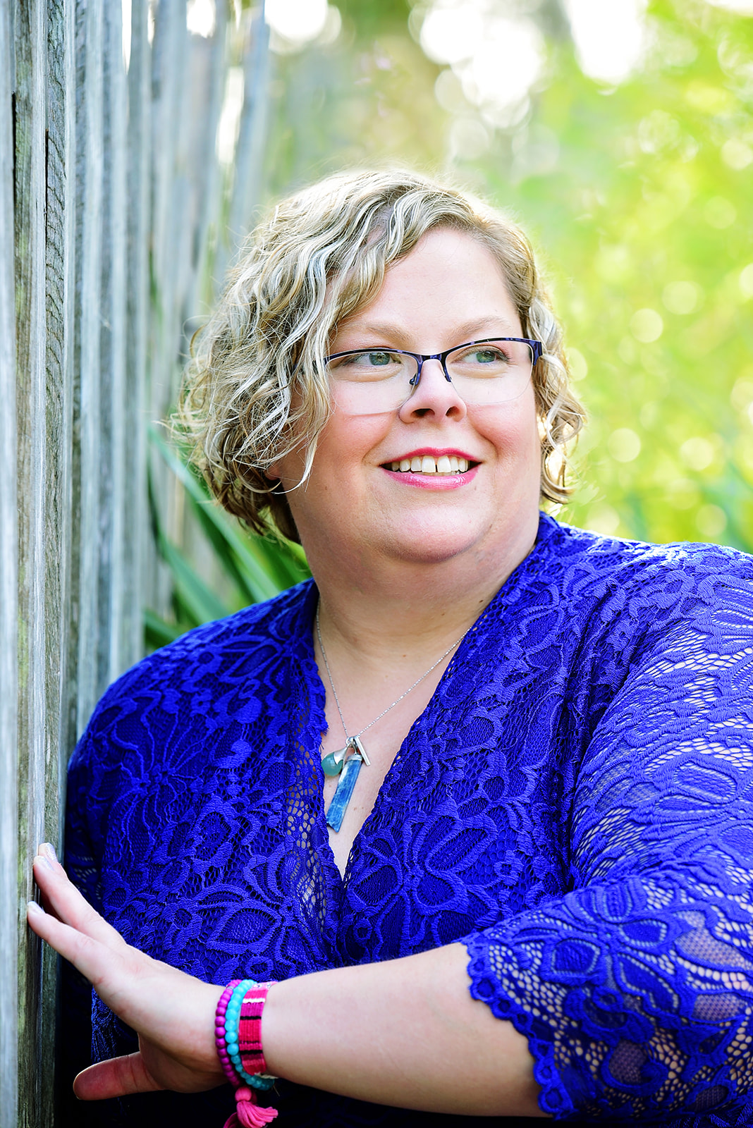 Shannon Kelly, founder of Endless Ocean Coaching, smiling outdoors