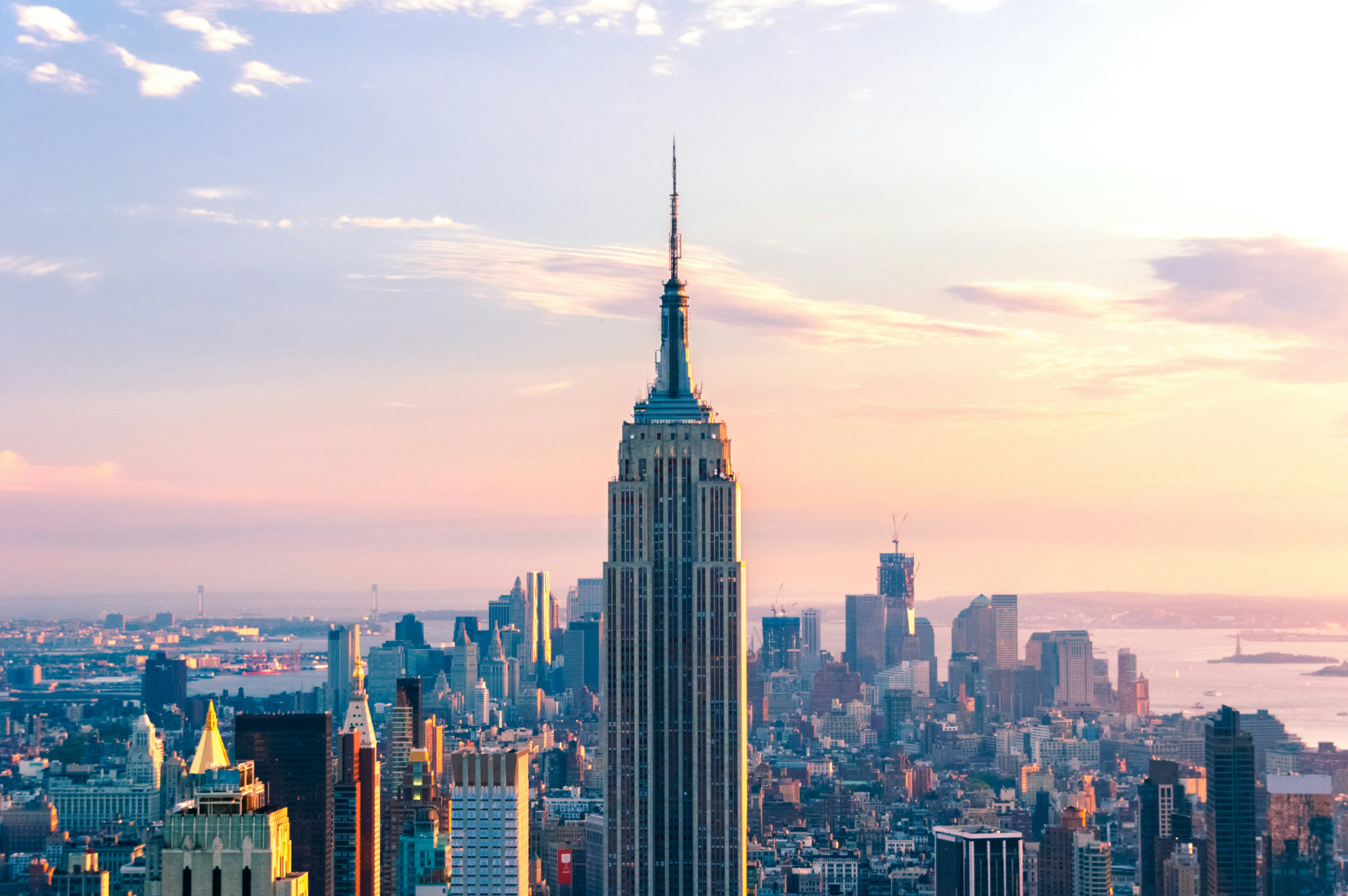 Aerial view of the New York City skyline with the Empire State Building at sunset
