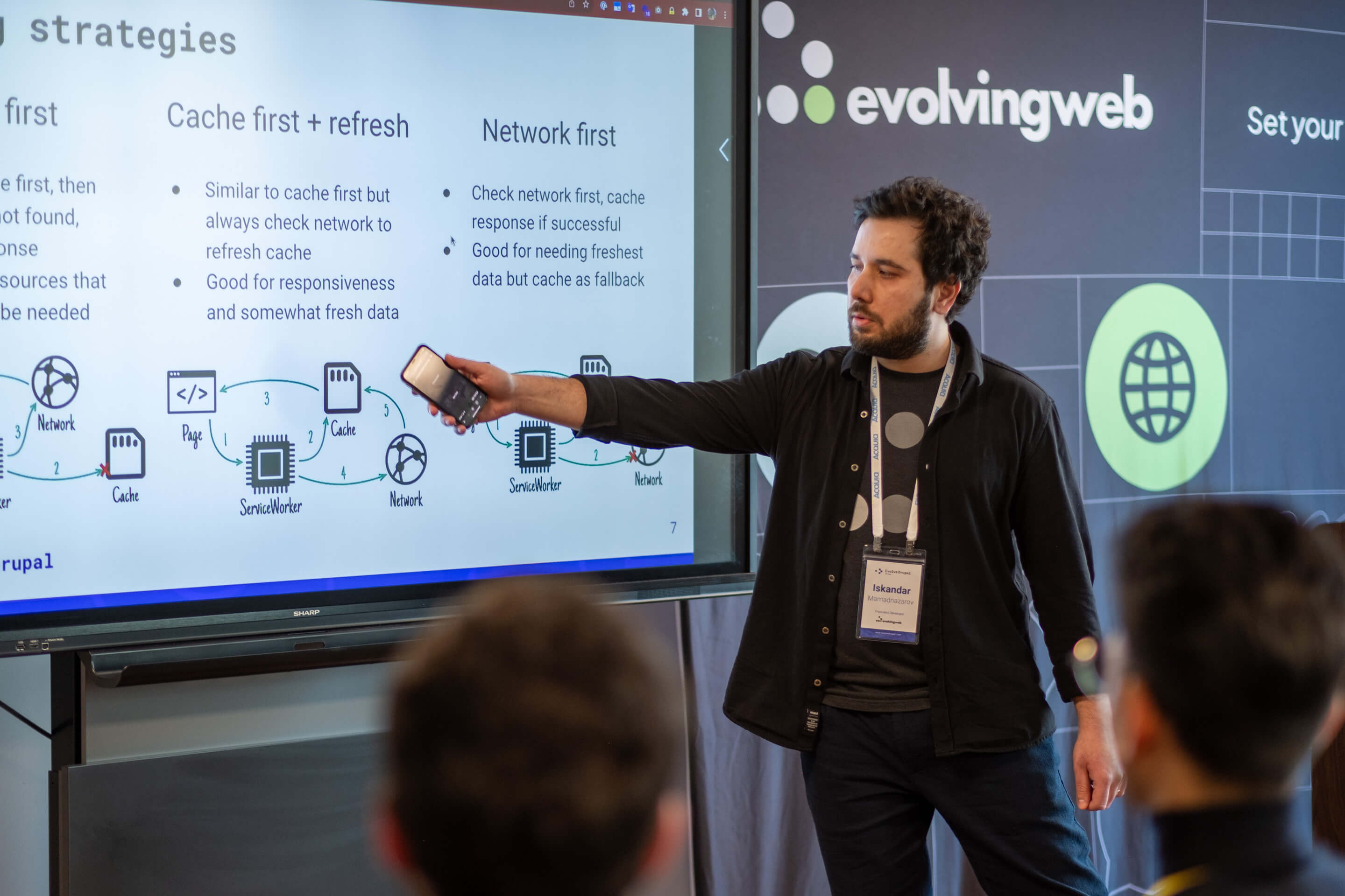 Speaker presenting a technical slide about caching strategies at EvolveDrupal Ottawa