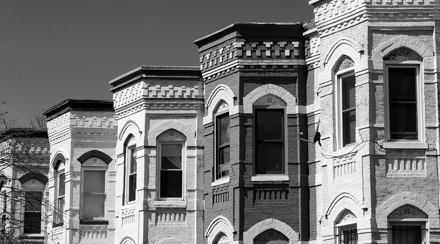 Historic Washington, DC brick rowhouses in black and white