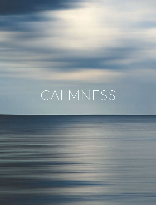 Serene ocean scene with the word Calmness overlaid