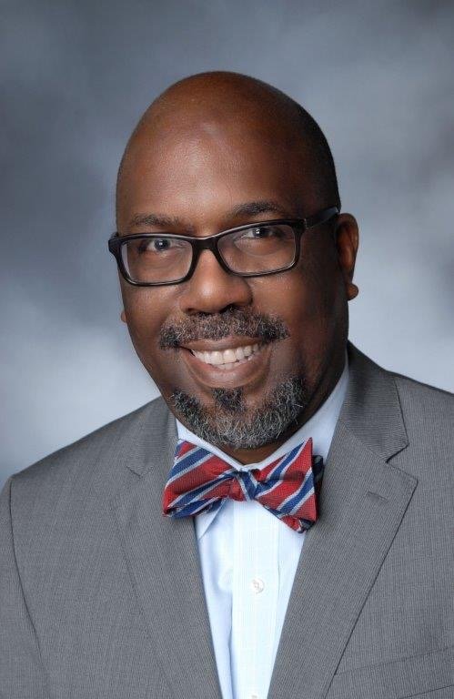 Dr. Reginald Tucker-Seeley