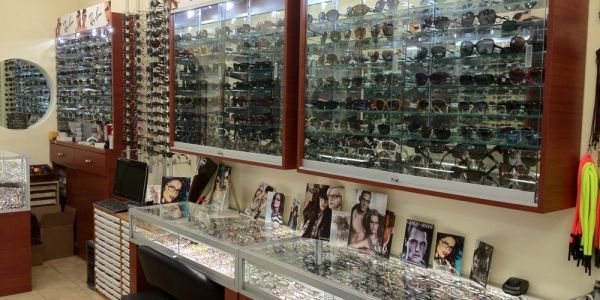 HMY Vision Gramercy Park interior: wall cases full of sunglasses and eyeglass frames
