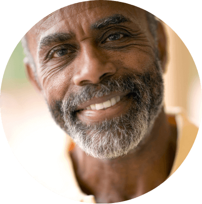 Jarvis, a smiling older man with a grey beard