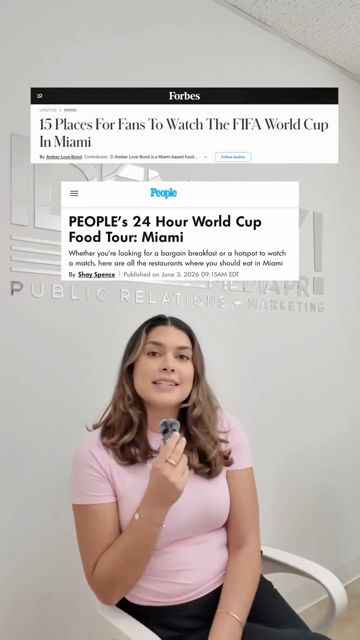 Identity Media PR team member on camera with Forbes and People articles about the FIFA World Cup in Miami