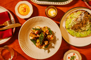 À la carte spread of Ishq dishes with candles