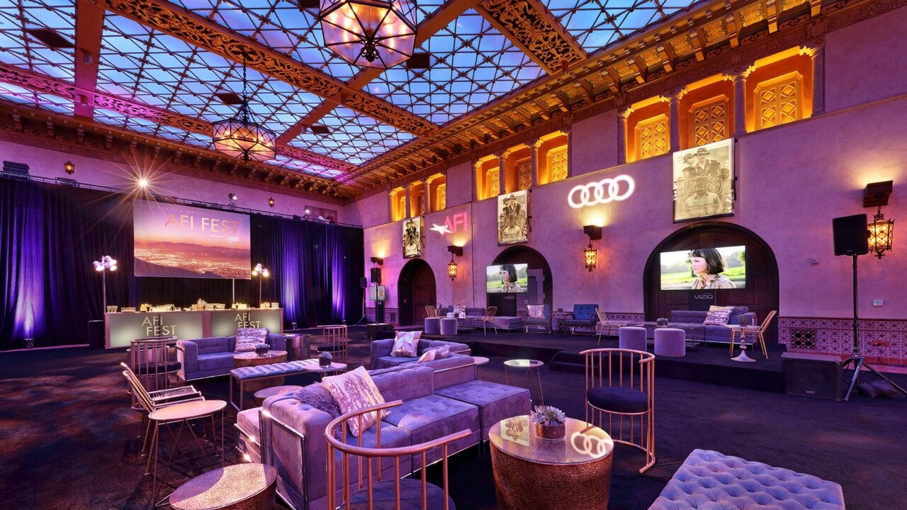 Decorated AFI Fest venue interior with purple lighting