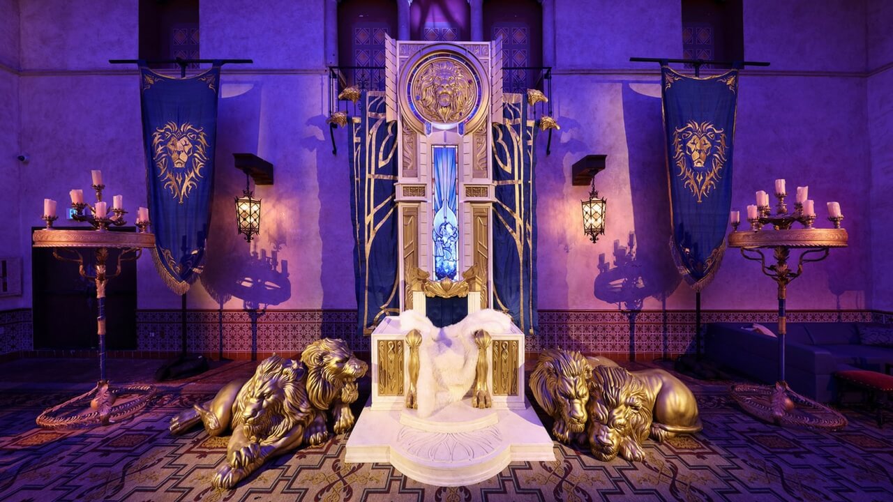 Warcraft movie premiere interior with golden lion throne and Alliance banners