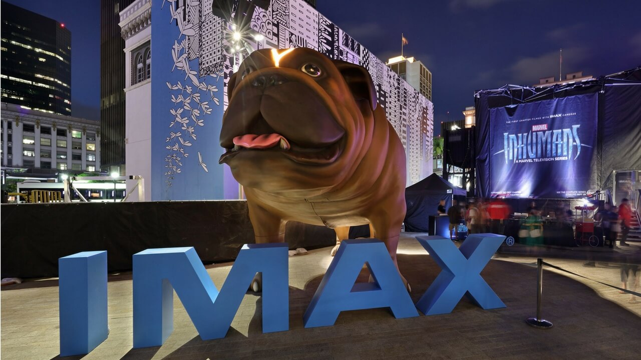 IMAX Marvel Inhumans Comic-Con activation with giant bulldog statue and IMAX letters at night