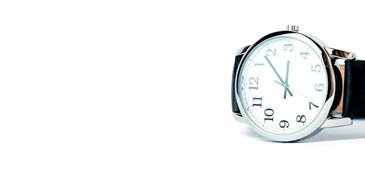 Classic silver wristwatch with a black leather strap