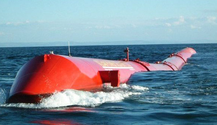 Red wave energy converter device floating on the ocean